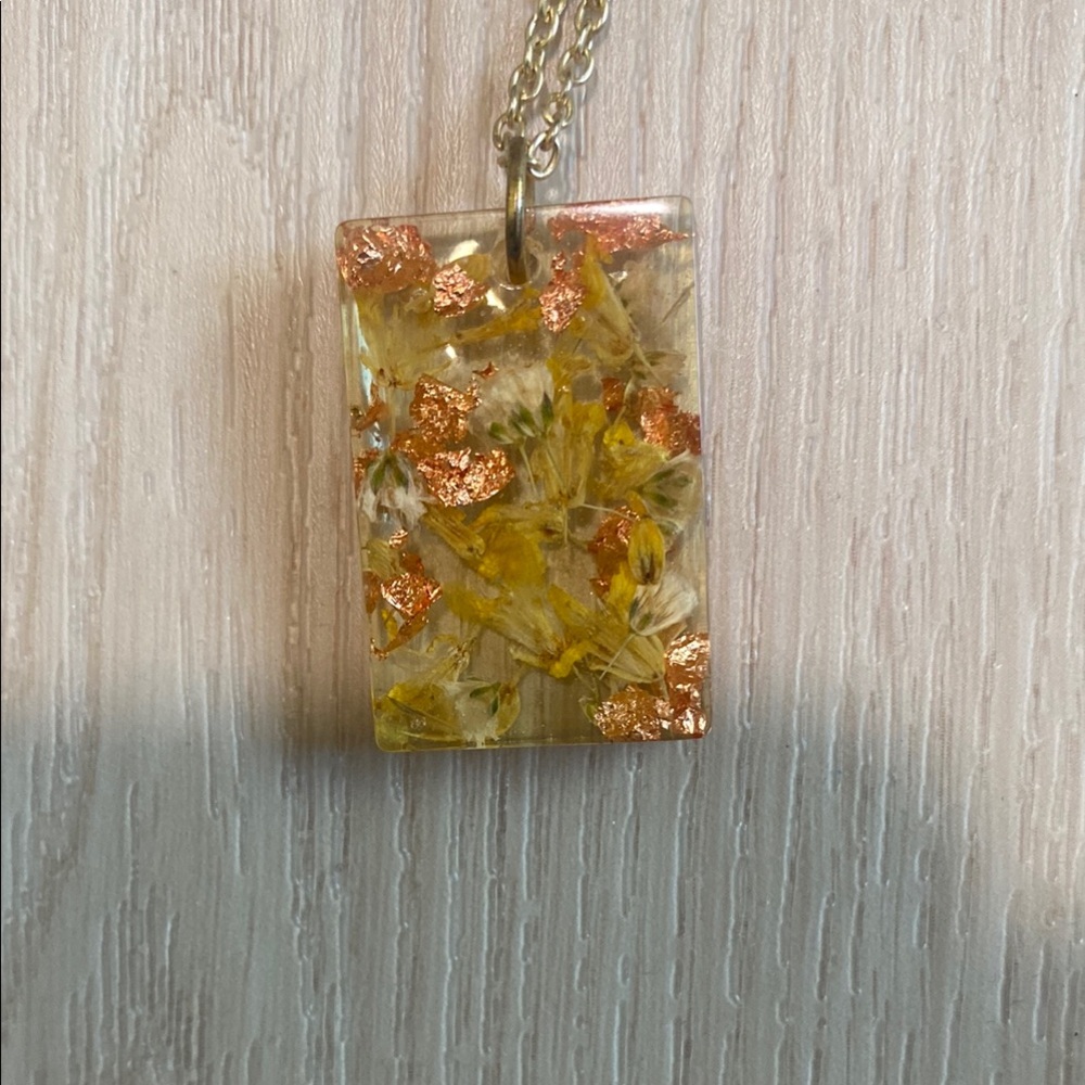 Gold Pendant Necklace with Floral Design